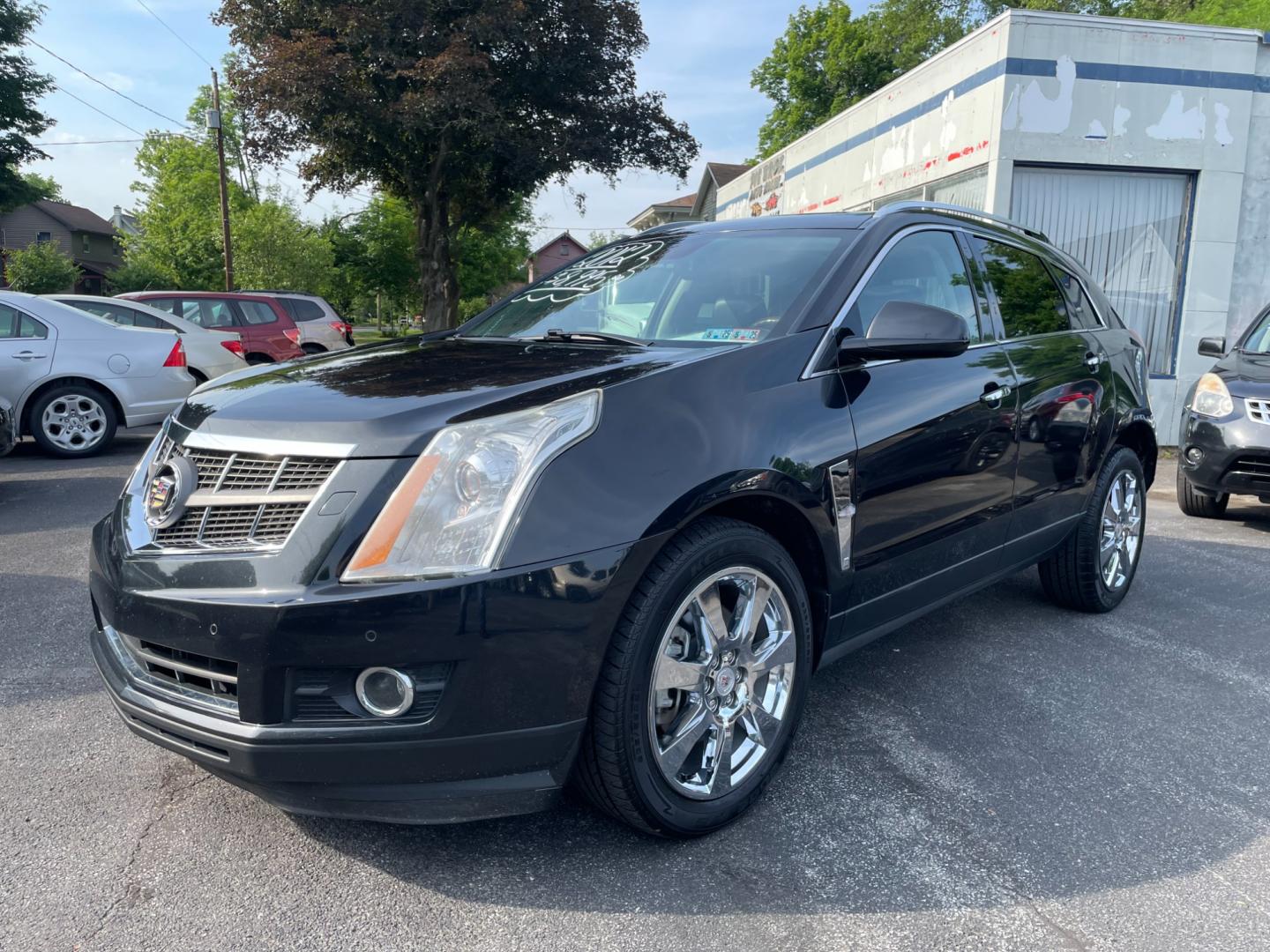 2012 black Cadillac SRX Premium (3GYFNCE33CS) with an 3.6L V6 DOHC 24V FFV engine, 6-Speed Automatic transmission, located at 101 N. Main Street, Muncy, PA, 17756, (570) 546-5462, 41.207691, -76.785942 - Photo#0